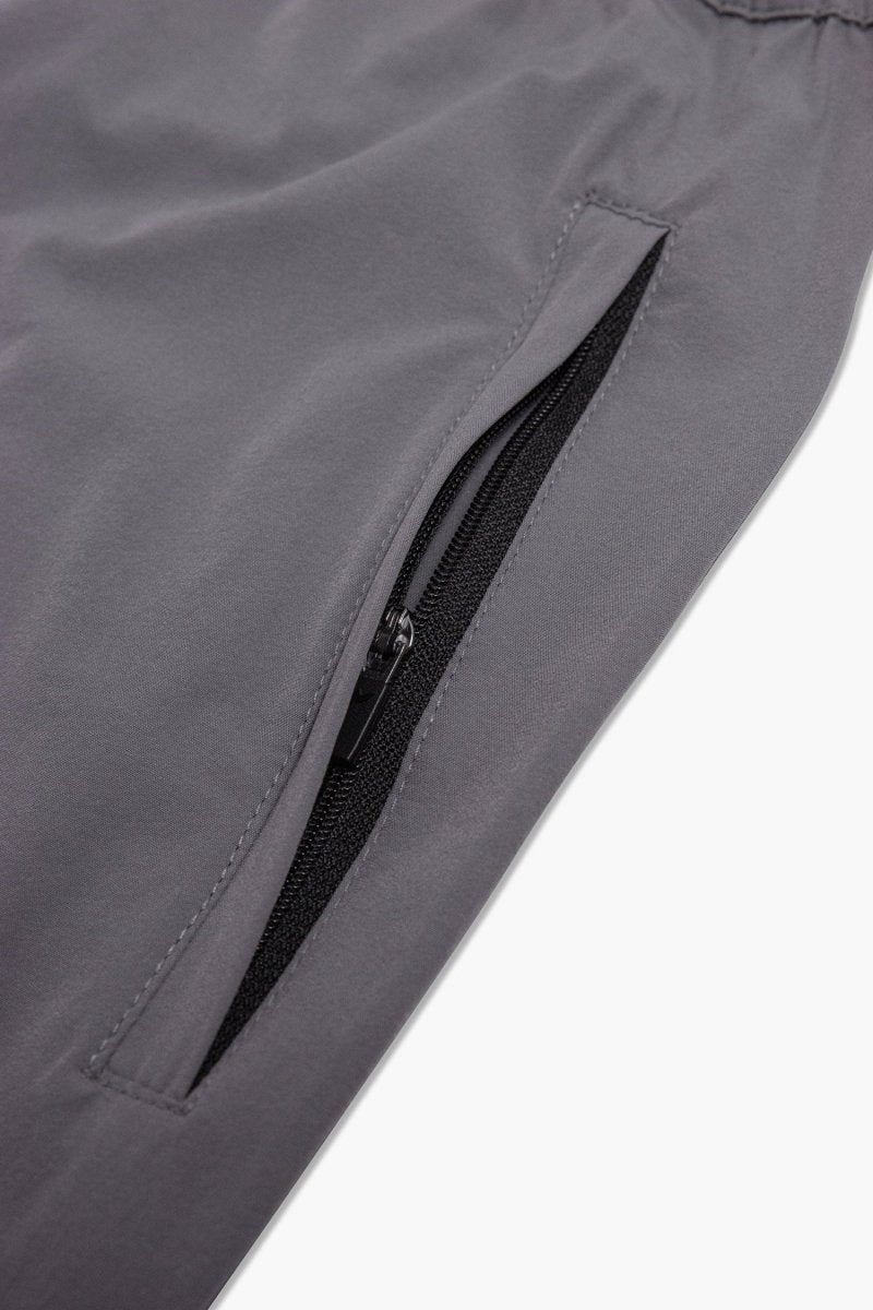 Side view of men’s workout shorts showcasing angled pocket and lightweight fabric