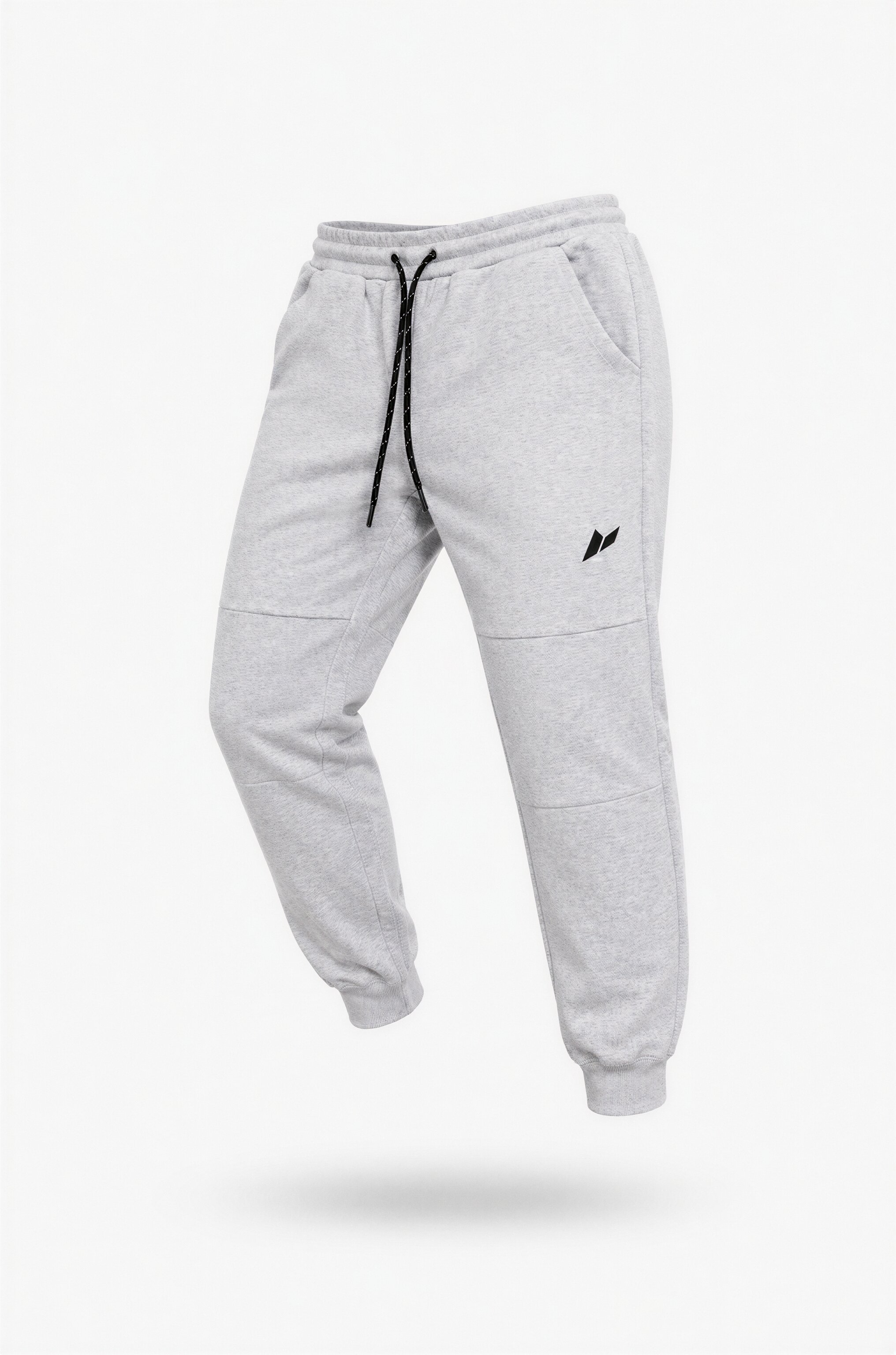 Zuva Grey Track Pants angled product shot — ash grey marl heavyweight fleece with black drawstring waistband, embroidered Zuva icon and ribbed cuffed ankles
